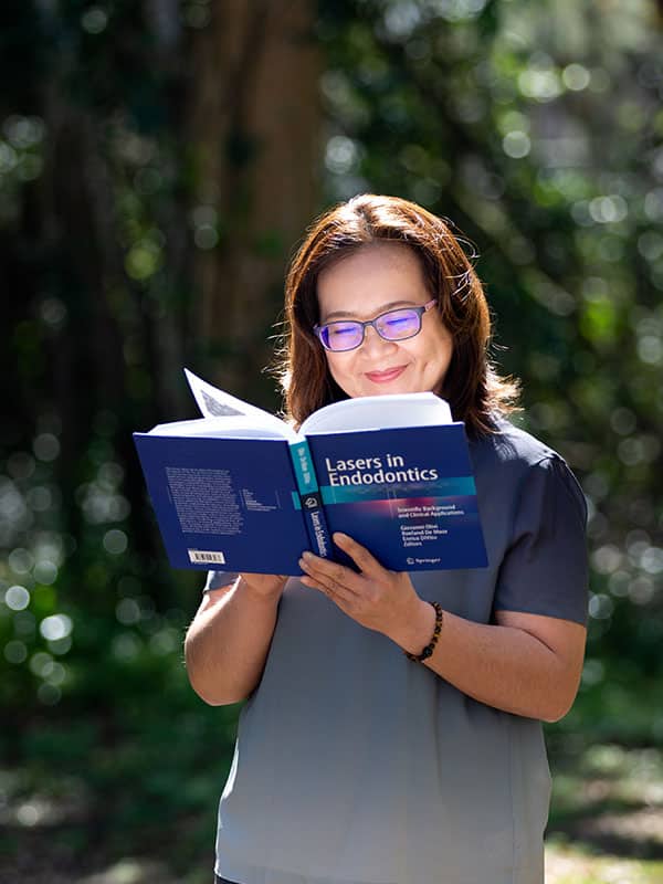 Dr. Bonnie Yang reading book 
