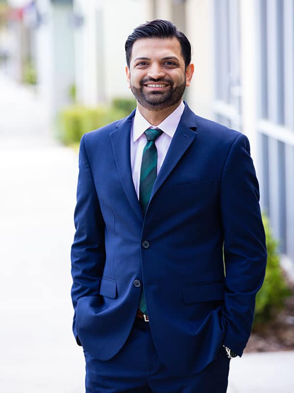 Dr. Tej Vaidya in suit 