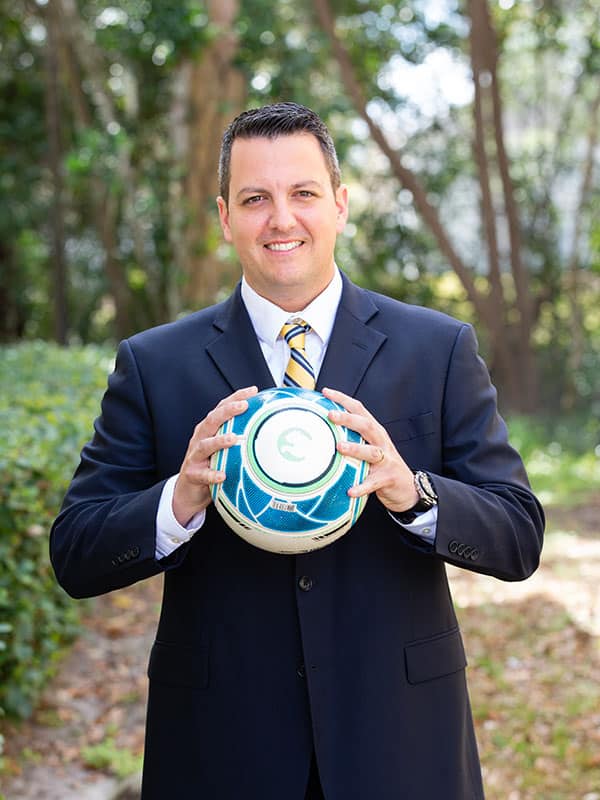 Dr. Luis Alcalde with ball 