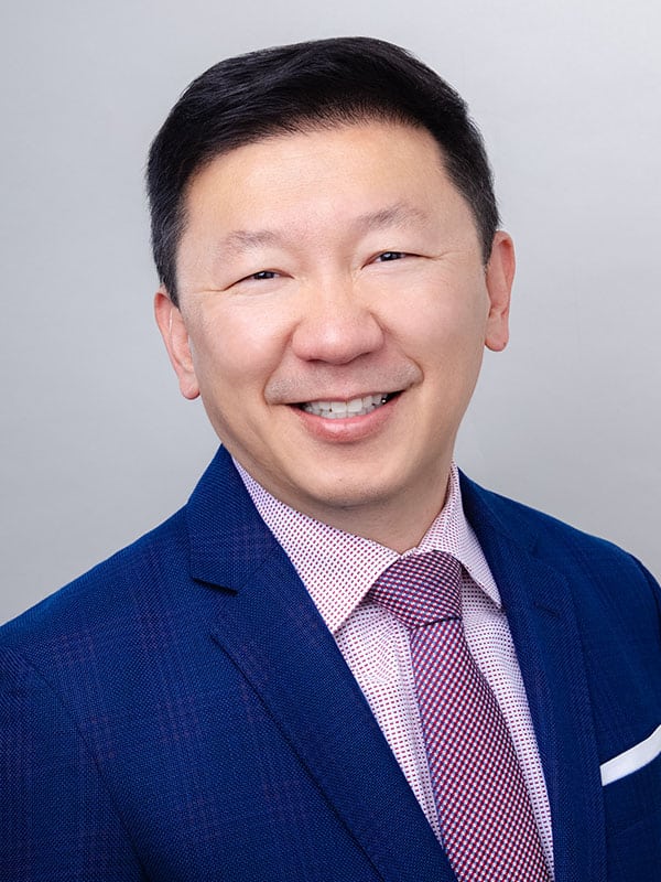 Dr. Peter S. Chen in suit 